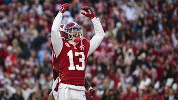 Nov 30, 2024; Tuscaloosa, Alabama, USA; Alabama Crimson Tide defensive back Malachi Moore (13) celebrates after a play against the Auburn Tigers during the second quarter at Bryant-Denny Stadium. Mandatory Credit: Will McLelland-Imagn Images
