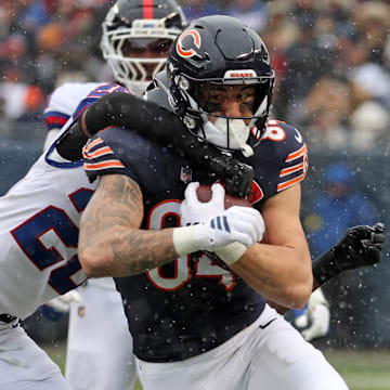Nov 9, 2025; Chicago, Illinois, USA; Chicago Bears tight end Colston Loveland (84) makes a catch over New York Giants cornerback Cordale Flott (28) during the second half at Soldier Field. Mandatory Credit: Mike Dinovo-Imagn Images