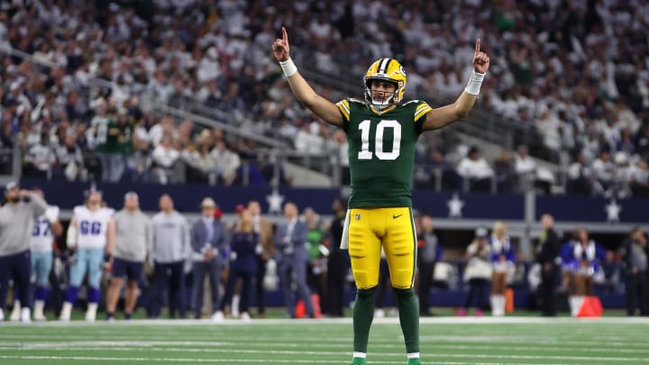 Green Bay Packers quarterback Jordan Love (10) reacts after a touchdown against the Dallas Cowboys during the 2023 playoffs.