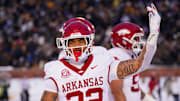 Arkansas Razorbacks running back Ja'Quinden Jackson (22) celebrates after scoring against the Missouri Tigers during the second half at Faurot Field at Memorial Stadium.