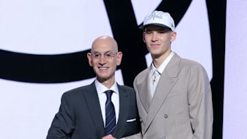 Jun 25, 2025; Brooklyn, NY, USA;  Egor Demin stands with NBA commissioner Adam Silver after being selected as the eighth pick by the Brooklyn Nets in the first round of the 2025 NBA Draft at Barclays Center. Mandatory Credit: Brad Penner-Imagn Images