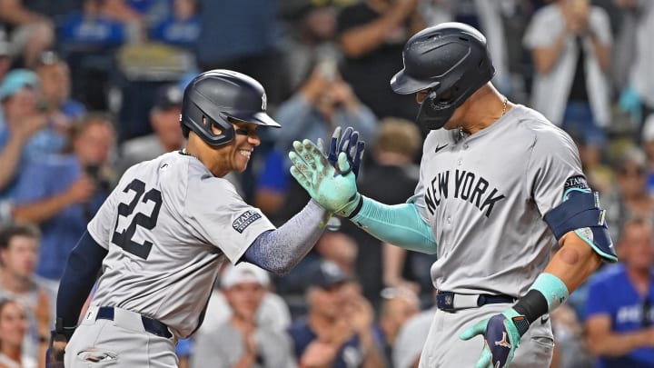 New York Yankees center fielder Aaron Judge (99) celebrates with Juan Soto (22) after hitting a two-run home run in the seventh inning against the Kansas City Royals at Kauffman Stadium on June 11.
