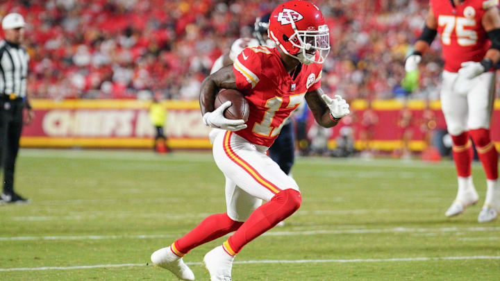 Aug 22, 2024; Kansas City, Missouri, USA; Kansas City Chiefs wide receiver Mecole Hardman (17) runs the ball against the Chicago Bears during the game at GEHA Field at Arrowhead Stadium. Mandatory Credit: Denny Medley-Imagn Images