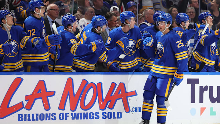 Mar 14, 2026; Buffalo, New York, USA;  Buffalo Sabres defenseman Owen Power (25) celebrates his goal with teammates during the first period against the Toronto Maple Leafs at KeyBank Center. Mandatory Credit: Timothy T. Ludwig-Imagn Images