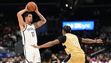 Nov 16, 2025; Washington, District of Columbia, USA;  Brooklyn Nets forward Michael Porter Jr. (17) looks to pass over Washington Wizards guard Bilal Coulibaly (0) during the first quarter at Capital One Arena. Mandatory Credit: Rafael Suanes-Imagn Images
