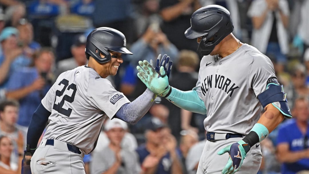 Jun 11, 2024; Kansas City, Missouri, USA; New York Yankees center fielder Aaron Judge (99) celebrates with Juan Soto (22) after hitting a two-run home run in the seventh inning against the Kansas City Royals at Kauffman Stadium.