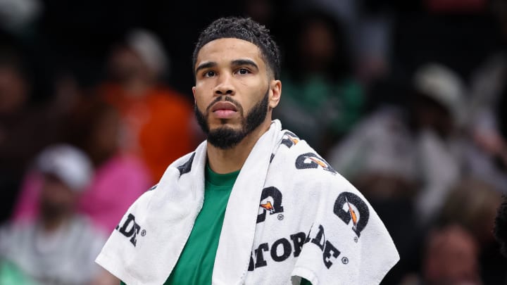 Mar 17, 2024; Washington, District of Columbia, USA; Boston Celtics forward Jayson Tatum (0) looks on from the bench against the Washington Wizards during the second half of the game at Capital One Arena. 