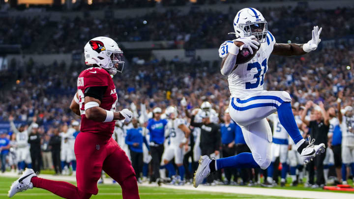 Indianapolis Colts running back Tyler Goodson (31) jumps into the end zone for a touchdown Saturday, Aug. 17, 2024, before a preseason game between the Indianapolis Colts and the Arizona Cardinals at Lucas Oil Stadium in Indianapolis.