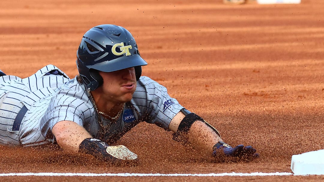 May 31, 2025; Oxford, MS, USA; Georgia Tech Yellowjackets outfielder Drew Burress (8) slides into third base during the first inning against the Murray State Racers. Mandatory Credit: Petre Thomas-Imagn Images May 31, 2025; Oxford, MS, USA; Georgia Tech Yellowjackets outfielder Drew Burress (8) slides into third base during the first inning against the Murray State Racers. Mandatory Credit: Petre Thomas-Imagn Images