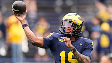 Michigan quarterback Bryce Underwood (19) throws at warm up before the spring game at Michigan Stadium in Ann Arbor on Saturday, April 19, 2025.