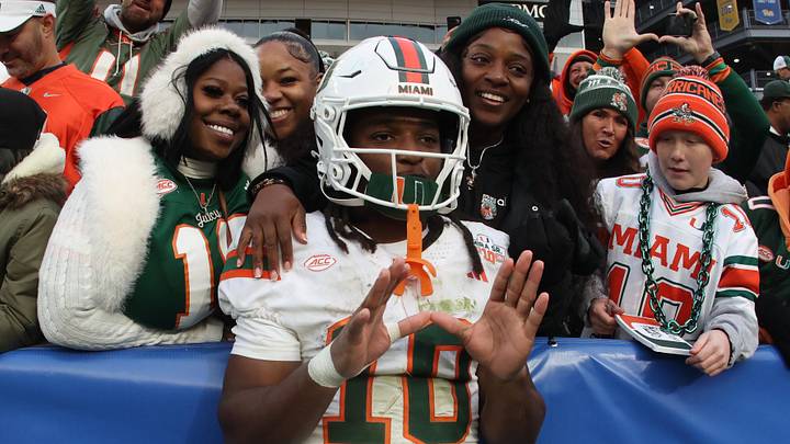 Nov 29, 2025; Pittsburgh, Pennsylvania, USA;  Miami Hurricanes wide receiver Malachi Toney (10) celebrates with family and friends after defeating the Pittsburgh Panthers at Acrisure Stadium. Mandatory Credit: Charles LeClaire-Imagn Images