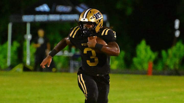 West Boca Raton's Javian Mallory runs during a win over Benjamin on Thursday, Aug. 22, 2024. West Boca Raton's Javian Mallory runs during a win over Benjamin on Thursday, Aug. 22, 2024.