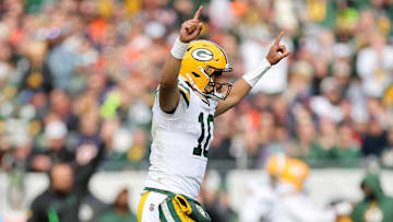 Green Bay Packers quarterback Jordan Love celebrates against the Chicago Bears