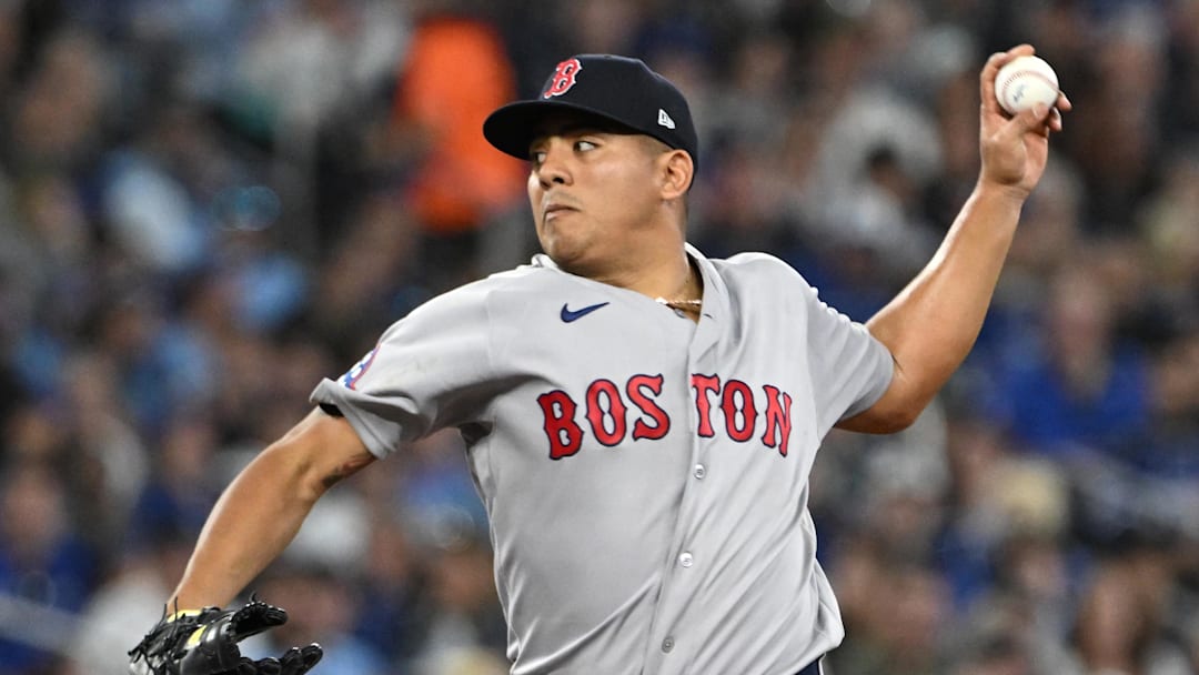 Apr 27, 2026; Toronto, Ontario, CAN;  Boston Red Sox starting pitcher Ranger Suarez (55) delivers a pitch against the Toronto Blue Jays in the second inning at Rogers Centre. Mandatory Credit: Dan Hamilton-Imagn Images