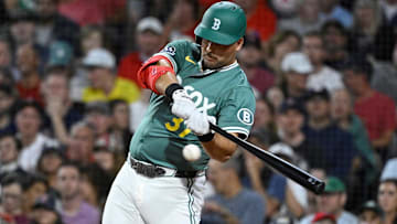 Boston Red Sox first baseman Nathaniel Lowe (37) hits a double against the Detroit Tigers during the second inning at Fenway Park. Mandatory Credit: Eric Canha-Imagn Images