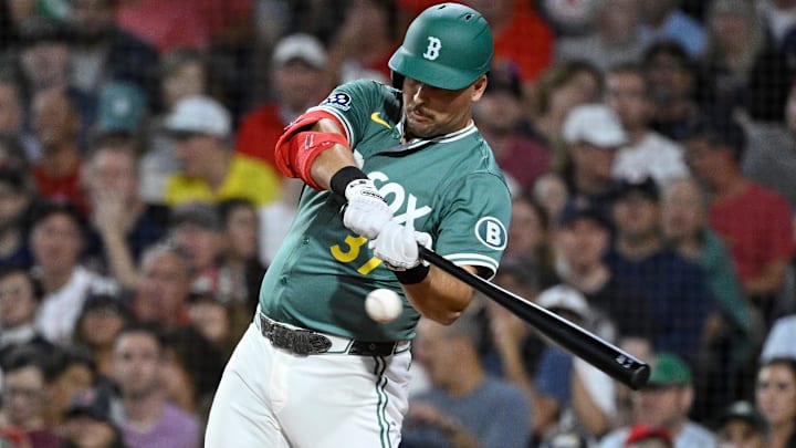 Boston Red Sox first baseman Nathaniel Lowe (37) hits a double against the Detroit Tigers during the second inning at Fenway Park. Mandatory Credit: Eric Canha-Imagn Images