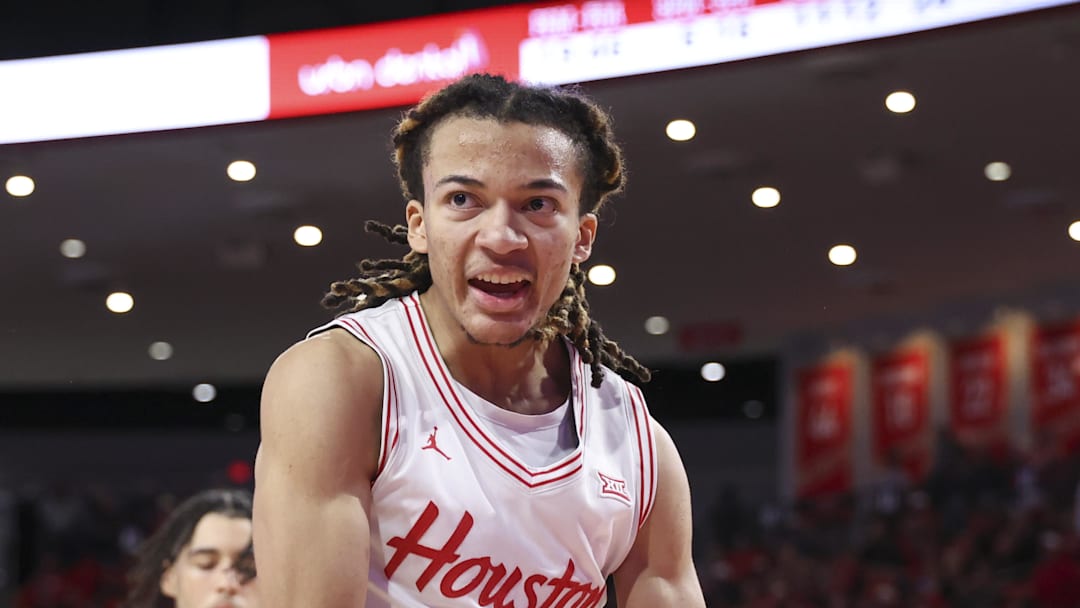 Houston Cougars guard Kingston Flemings (4) reacts after dunking the ball during the second half against the Middle Tennessee Blue Raiders at Fertitta Center