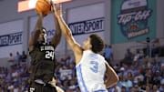 Nov 25, 2025; Fort Myers, Florida, USA; St. Bonaventure Bonnies guard Cayden Charles (24) shoots the ball over North Carolina Tar Heels guard Derek Dixon (3) in the second half at Suncoast Credit Union Arena. Mandatory Credit: Nathan Ray Seebeck-Imagn Images
