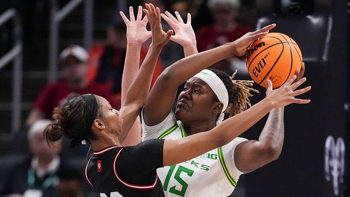 Oregon Ducks center Phillipina Kyei worked under the basket for 5 points and three rebounds in the first quarter, sparking the Ducks to a 12-9 lead as 14.5-point underdogs against Duke in Cameron Indoor Stadium.