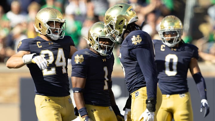 Notre Dame defensive lineman Boubacar Traore, second from right, celebrates getting a stop during a NCAA college football game between Notre Dame and Northern Illinois at Notre Dame Stadium on Saturday, Sept. 7, 2024, in South Bend.