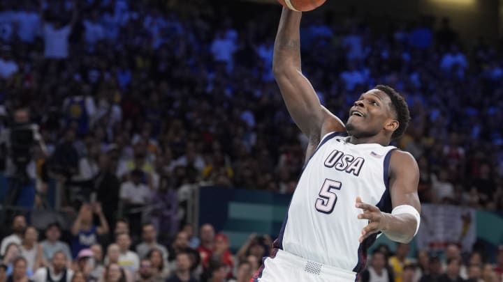 Jul 31, 2024; Villeneuve-d'Ascq, France; United States guard Anthony Edwards (5) dunks in the fourth quarter against South Sudan during the Paris 2024 Olympic Summer Games at Stade Pierre-Mauroy. Mandatory Credit: John David Mercer-USA TODAY Sports