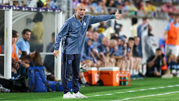 Jul 30, 2024; Orlando, FL, USA; Manchester City head coach Pep Guardiola directs his team against Barcelona in the first half  during a Champions Tour friendly match at Camping World Stadium. Mandatory Credit: Nathan Ray Seebeck-Imagn Images