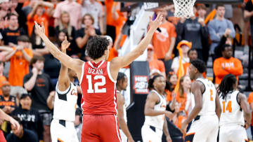 Oklahoma guard Milos Uzan (12) celebrates in overtime during an NCAA basketball game between Oklahoma and Oklahoma State in Stillwater, Okla., on Saturday, Feb. 24, 2024.