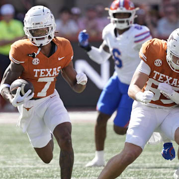 Nov 9, 2024; Austin, Texas, USA; Texas Longhorns wide receiver Isaiah Bond (7) runs for yardage after making a catch during the first half against the Florida Gators at Darrell K Royal-Texas Memorial Stadium. Mandatory Credit: Scott Wachter-Imagn Images