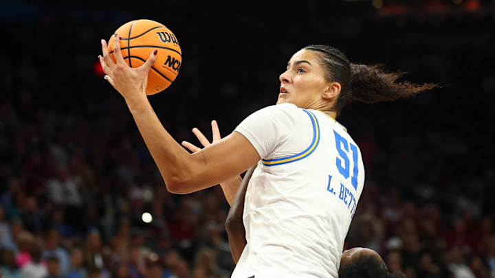 Apr 5, 2026; Phoenix, AZ, USA; UCLA Bruins center Lauren Betts (51) rebounds the ball against the South Carolina Gamecocks in the third quarter during the National Championship game of the women's 2026 NCAA Tournament at Mortgage Matchup Center. Mandatory Credit: Mark J. Rebilas-Imagn Images