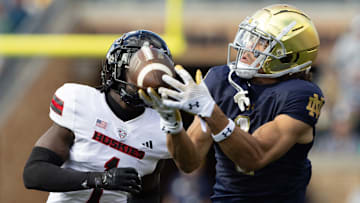 Notre Dame wide receiver Jaden Greathouse, right, drops a catch with Northern Illinois defensive back Jashon Prophete chasing during a NCAA college football game between Notre Dame and Northern Illinois at Notre Dame Stadium on Saturday, Sept. 7, 2024, in South Bend.