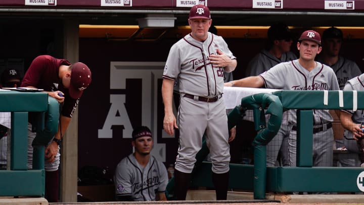 Jun 11, 2022; College Station, TX, USA;  Texas A&M head coach Jim Schlossnagle calls a play in the 2nd inning against Louisville at Blue Bell Park.