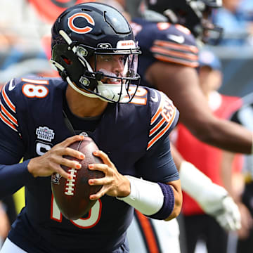 Sep 8, 2024; Chicago, Illinois, USA; Chicago Bears quarterback Caleb Williams (18) drops back to pass against the Tennessee Titans during the second quarter at Soldier Field.