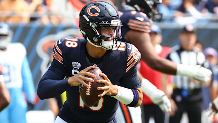 Sep 8, 2024; Chicago, Illinois, USA; Chicago Bears quarterback Caleb Williams (18) drops back to pass against the Tennessee Titans during the second quarter at Soldier Field.