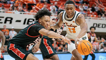 Mar 5, 2024; Stillwater, Oklahoma, USA; Texas Tech Red Raiders guard Darrion Williams (5) and