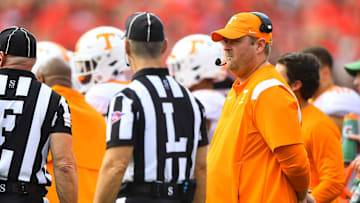 Tennessee head football coach Josh Heupel keeps his eyes on an official during Tennessee's game against Georgia at Sanford Stadium in Athens, Ga., on Saturday, Nov. 5, 2022.

Kns Vols Georgia Bp
