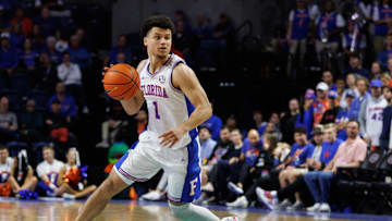 Dec 4, 2024; Gainesville, Florida, USA; Florida Gators guard Walter Clayton Jr. (1) dribbles the ball against the Virginia Cavaliers during the second half at Exactech Arena at the Stephen C. O'Connell Center. Mandatory Credit: Matt Pendleton-Imagn Images