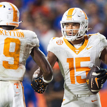 Tennessee wide receiver Bru McCoy (15) is congratulated by Tennessee wide receiver Ramel Keyton (9) after scoring a touchdown during a football game between Tennessee and Florida at Ben Hill Griffin Stadium in Gainesville, Fla., on Saturday, Sept. 16, 2023.