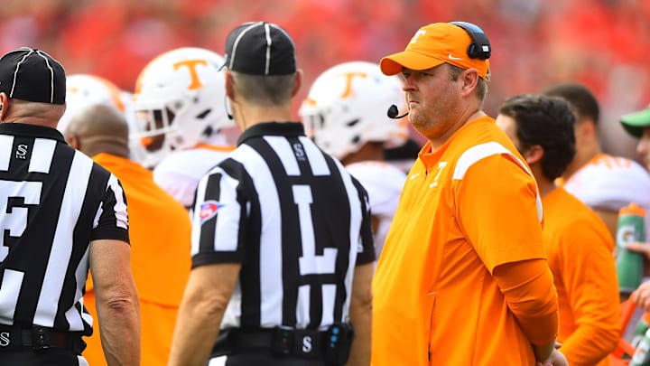 Tennessee head football coach Josh Heupel keeps his eyes on an official during Tennessee's game against Georgia at Sanford Stadium in Athens, Ga., on Saturday, Nov. 5, 2022.

Kns Vols Georgia Bp