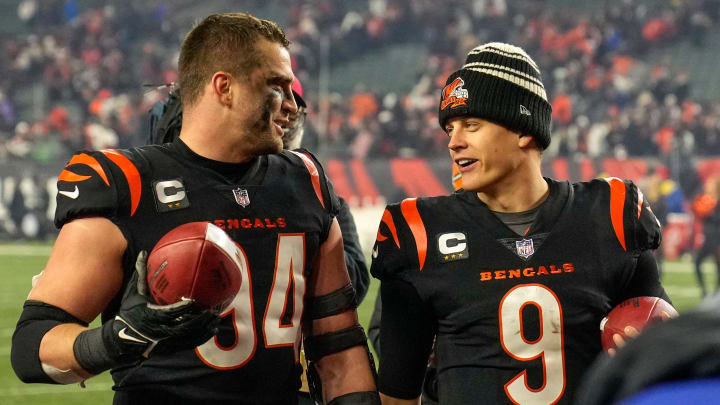 Cincinnati Bengals defensive end Sam Hubbard (94) and quarterback Joe Burrow (9) walk for the locker room after the fourth quarter during an NFL wild-card playoff football game between the Baltimore Ravens and the Cincinnati Bengals, Sunday, Jan. 15, 2023, at Paycor Stadium in Cincinnati. The Bengals advanced to the Divisional round of the playoffs with a 24-17 win over the Ravens.