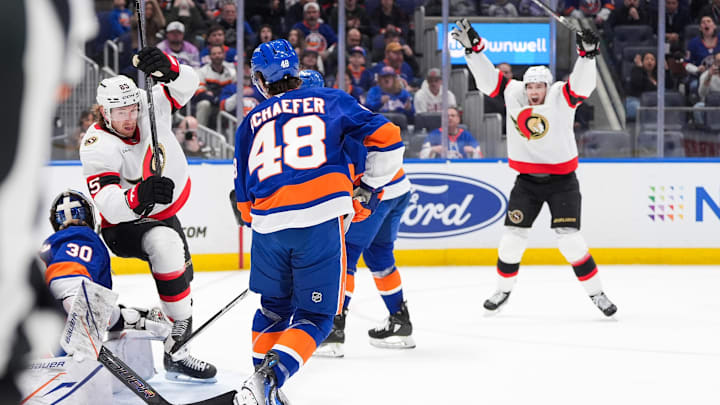 Apr 11, 2026; Elmont, New York, USA; Ottawa Senators defenseman Jake Sanderson (85) scores a goal in the third period against the New York Islanders at UBS Arena. Mandatory Credit: Alexander Wohl-Imagn Images