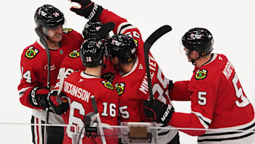 Dec 19, 2024; Chicago, Illinois, USA; Chicago Blackhawks right wing Ilya Mikheyev (95) celebrates a goal against the Seattle Kraken during the third period at United Center. Mandatory Credit: David Banks-Imagn Images