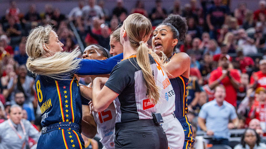 Indiana Fever guard Sophie Cunningham and Connecticut Sun guard Jacy Sheldon scuffle. | Trevor Ruszkowski-Imagn Images