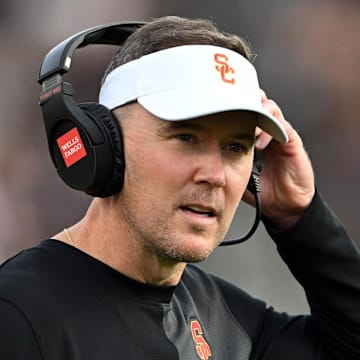 Sep 13, 2025; West Lafayette, Indiana, USA; Southern California Trojans head coach Lincoln Riley stands on the sidelines during the first quarter against the Purdue Boilermakers at Ross-Ade Stadium. Mandatory Credit: Marc Lebryk-Imagn Images