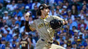 Oct 1, 2025; Chicago, Illinois, USA; San Diego Padres starting pitcher Dylan Cease (84) delivers a pitch against the Chicago Cubs in the first inning during game two of the Wildcard round for the 2025 MLB playoffs at Wrigley Field. Mandatory Credit: Matt Marton-Imagn Images