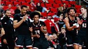 Feb 12, 2025; Raleigh, North Carolina, USA; Louisville Cardinals bench reacts during the second half of the game against the North Carolina State Wolfpack at Lenovo Center. 