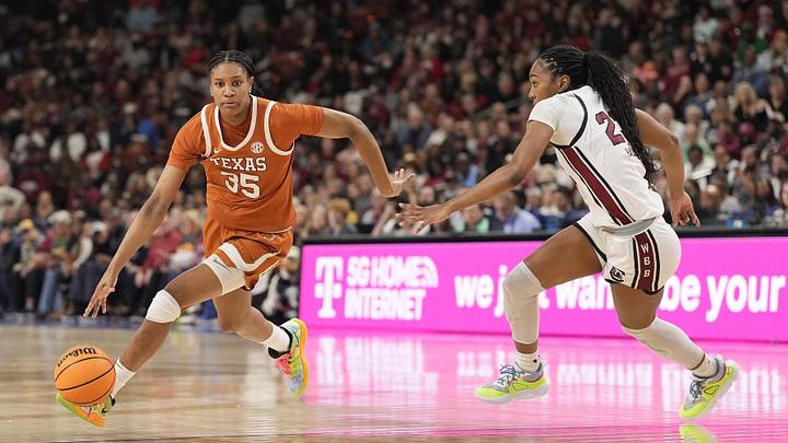 March 9, 2025; Greenville, SC, USA; Texas Longhorns forward Madison Booker (35) goes to the basket defended but South Carolina Gamecocks guard Bree Hall (23) during the first half at Bon Secours Wellness Arena. Mandatory Credit: Jim Dedmon-Imagn Images