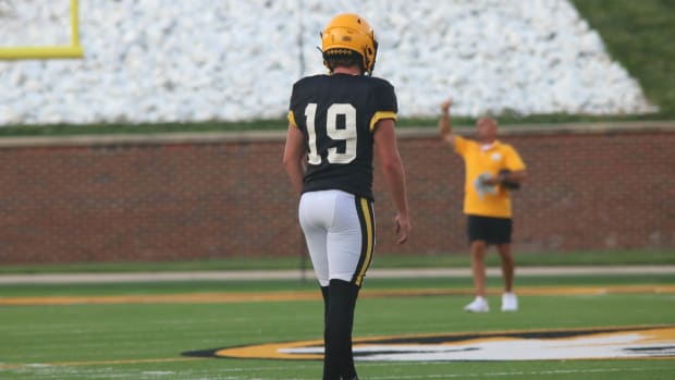 Missouri Tigers kicker Blake Craig (19) lines up for a kick at the team's annual fan night practice at Faurot Field at Memori