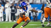 Dec 31, 2024; Glendale, AZ, USA; Boise State Broncos running back Ashton Jeanty (2) against the Penn State Nittany Lions during the Fiesta Bowl at State Farm Stadium. Mandatory Credit: Mark J. Rebilas-Imagn Images