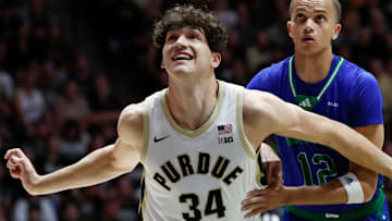 Purdue Boilermakers forward Raleigh Burgess (34) boxes out