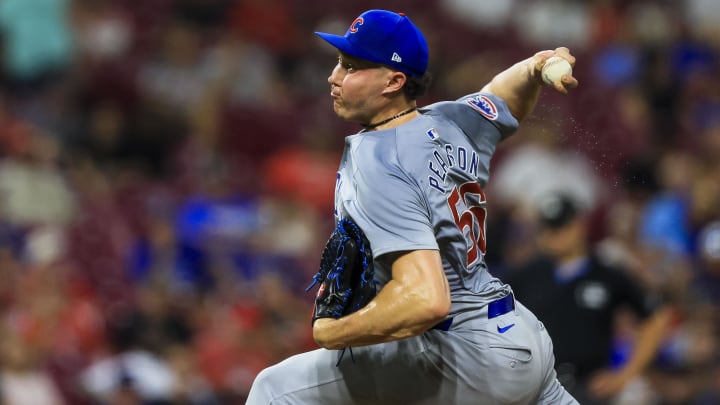 Jul 29, 2024; Cincinnati, Ohio, USA; Chicago Cubs relief pitcher Nate Pearson (56) pitches against the Cincinnati Reds in the eighth inning at Great American Ball Park.